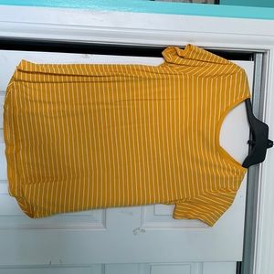 Yellow and white striped t shirt.